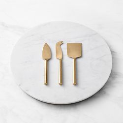 https://assets.wsimgs.com/wsimgs/rk/images/dp/wcm/202339/0180/marble-brass-cheese-board-with-cheese-knives-1-j.jpg