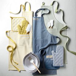 The Pot Holder and Apron Aisle at a Williams Sonoma Store at an