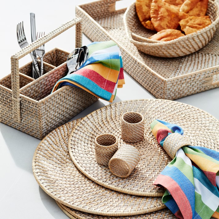 The woven wicker placemats help distinguish the glossy white