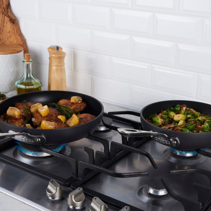 https://assets.wsimgs.com/wsimgs/rk/images/dp/wcm/202340/0036/all-clad-ha1-hard-anodized-nonstick-fry-pan-set-o.jpg