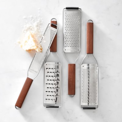 https://assets.wsimgs.com/wsimgs/rk/images/dp/wcm/202340/0052/microplane-walnut-master-series-fine-paddle-grater-m.jpg
