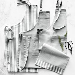 https://assets.wsimgs.com/wsimgs/rk/images/dp/wcm/202340/0068/williams-sonoma-bay-stripe-adult-kid-aprons-j.jpg