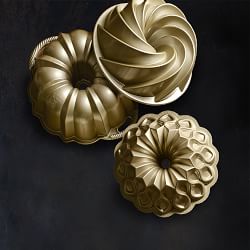 https://assets.wsimgs.com/wsimgs/rk/images/dp/wcm/202340/0146/nordic-ware-nonstick-cast-aluminum-70th-anniversary-crown--j.jpg