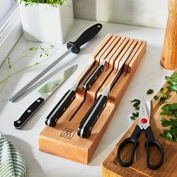 https://assets.wsimgs.com/wsimgs/rk/images/dp/wcm/202341/0030/zwilling-pro-in-drawer-knives-set-of-7-j.jpg