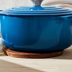 https://assets.wsimgs.com/wsimgs/rk/images/dp/wcm/202342/0117/le-creuset-magnetic-wooden-trivet-8-j.jpg