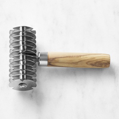 https://assets.wsimgs.com/wsimgs/rk/images/dp/wcm/202343/0231/williams-sonoma-olivewood-lattice-pastry-cutter-m.jpg