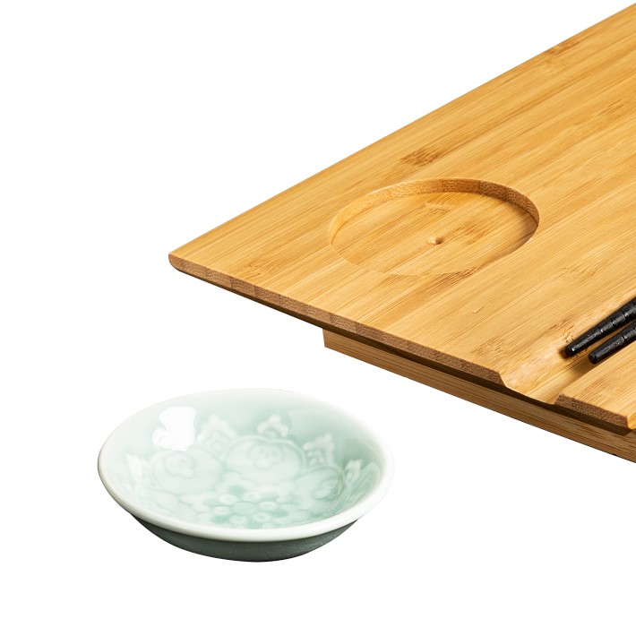 https://assets.wsimgs.com/wsimgs/rk/images/dp/wcm/202345/0033/joyce-chen-burnished-bamboo-sushi-board-set-o.jpg