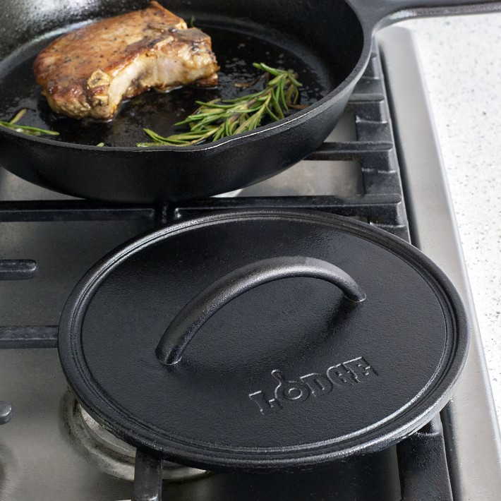 https://assets.wsimgs.com/wsimgs/rk/images/dp/wcm/202347/0102/lodge-cast-iron-round-flat-grill-press-o.jpg