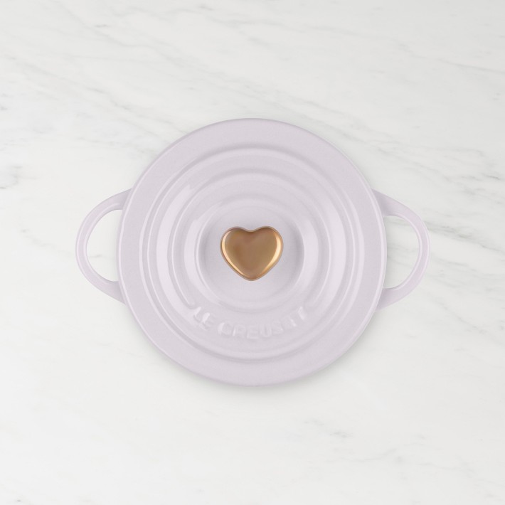 https://assets.wsimgs.com/wsimgs/rk/images/dp/wcm/202349/0248/le-creuset-mini-cocotte-with-heart-knob-o.jpg