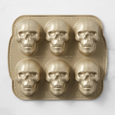 https://assets.wsimgs.com/wsimgs/rk/images/dp/wcm/202351/0014/nordic-ware-nonstick-cast-aluminum-skull-cakelet-pan-m.jpg