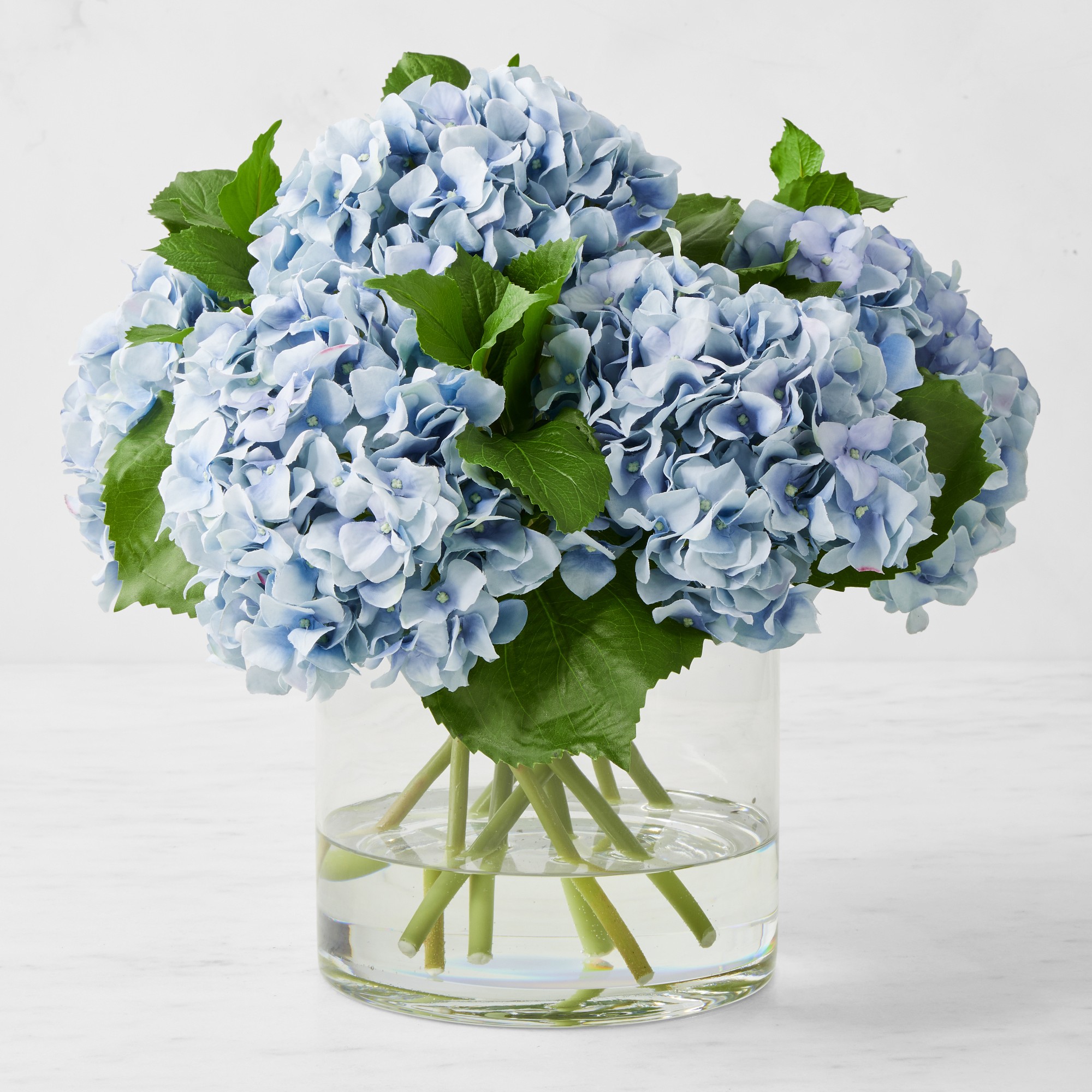 Faux Blue Hydrangea Arrangement in Glass Vase