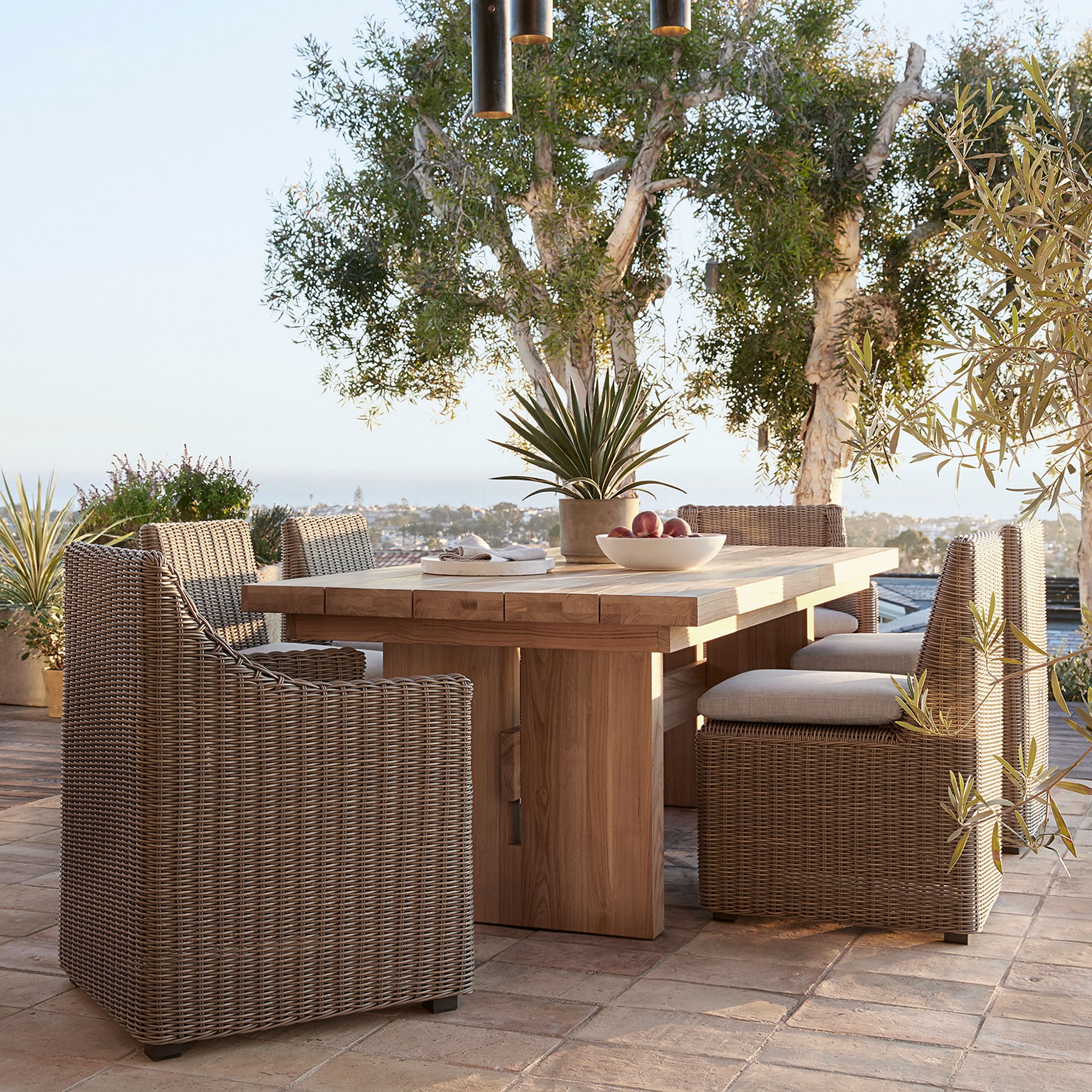 San Clemente Outdoor Teak Dining Table & All-Weather Weave Dining Chairs