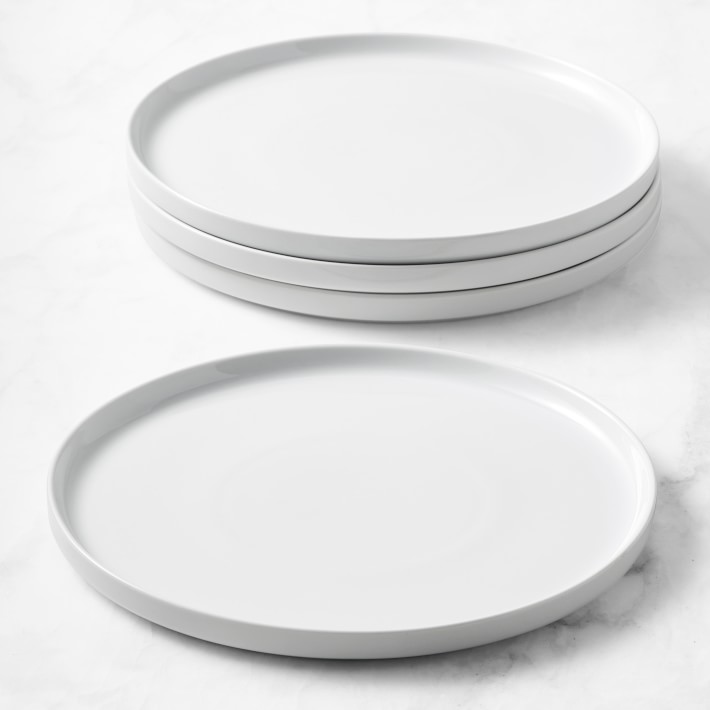 Large glossy white serving plate with textured edge popular