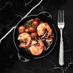 Lodge Seasoned Cast Iron Mini Round Server, Set of Four