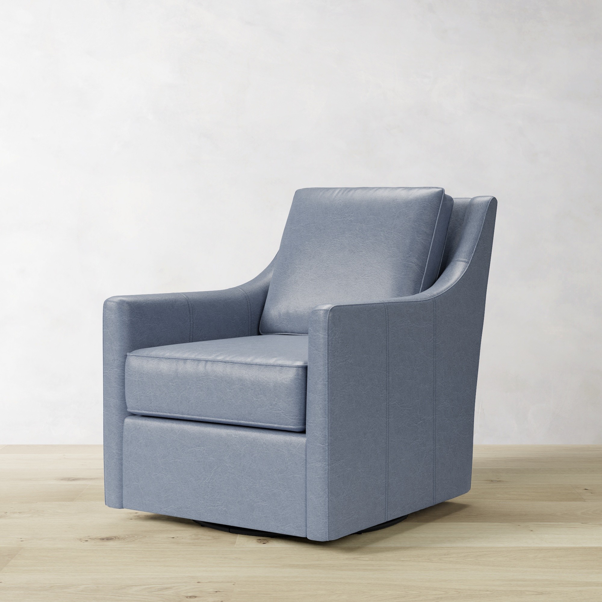 Beige upholstered armchair with modern boxy shape, front view highlighting deep seat and single cushion, base round platform.
