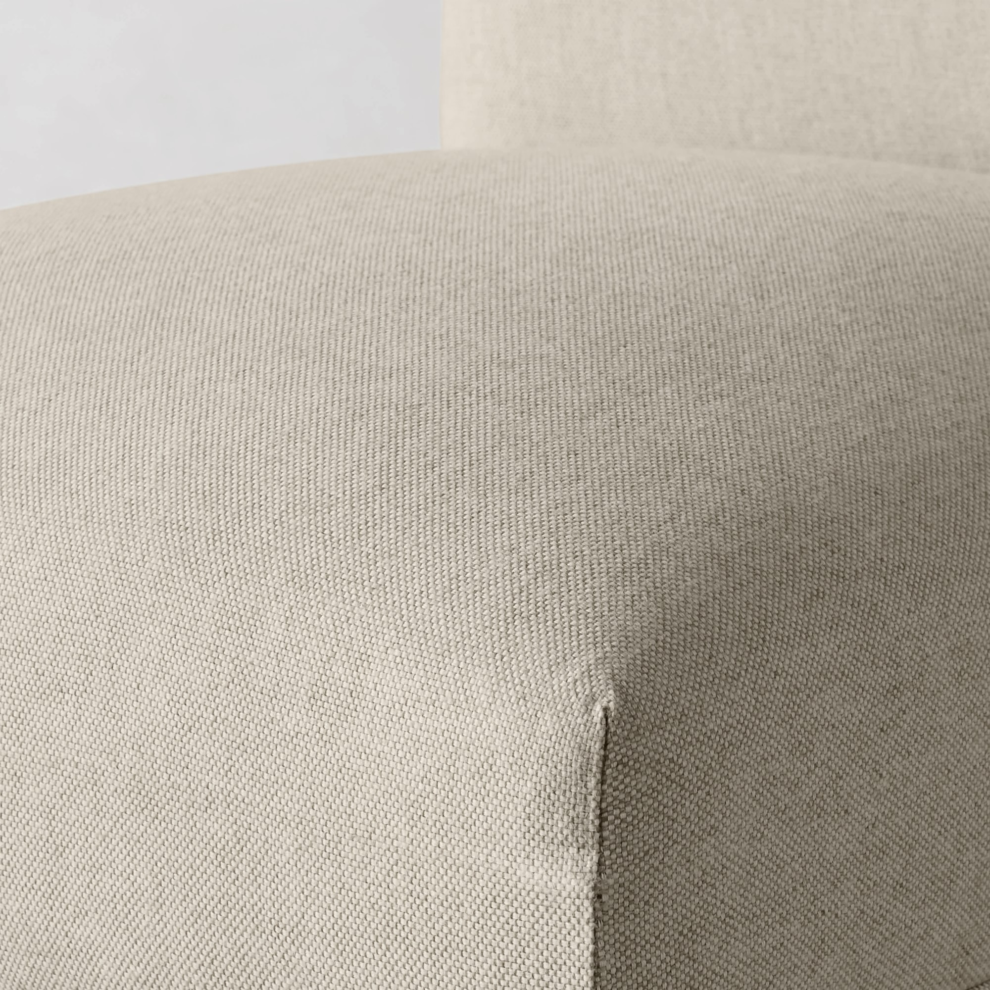 Close-up of fabric texture on beige chair