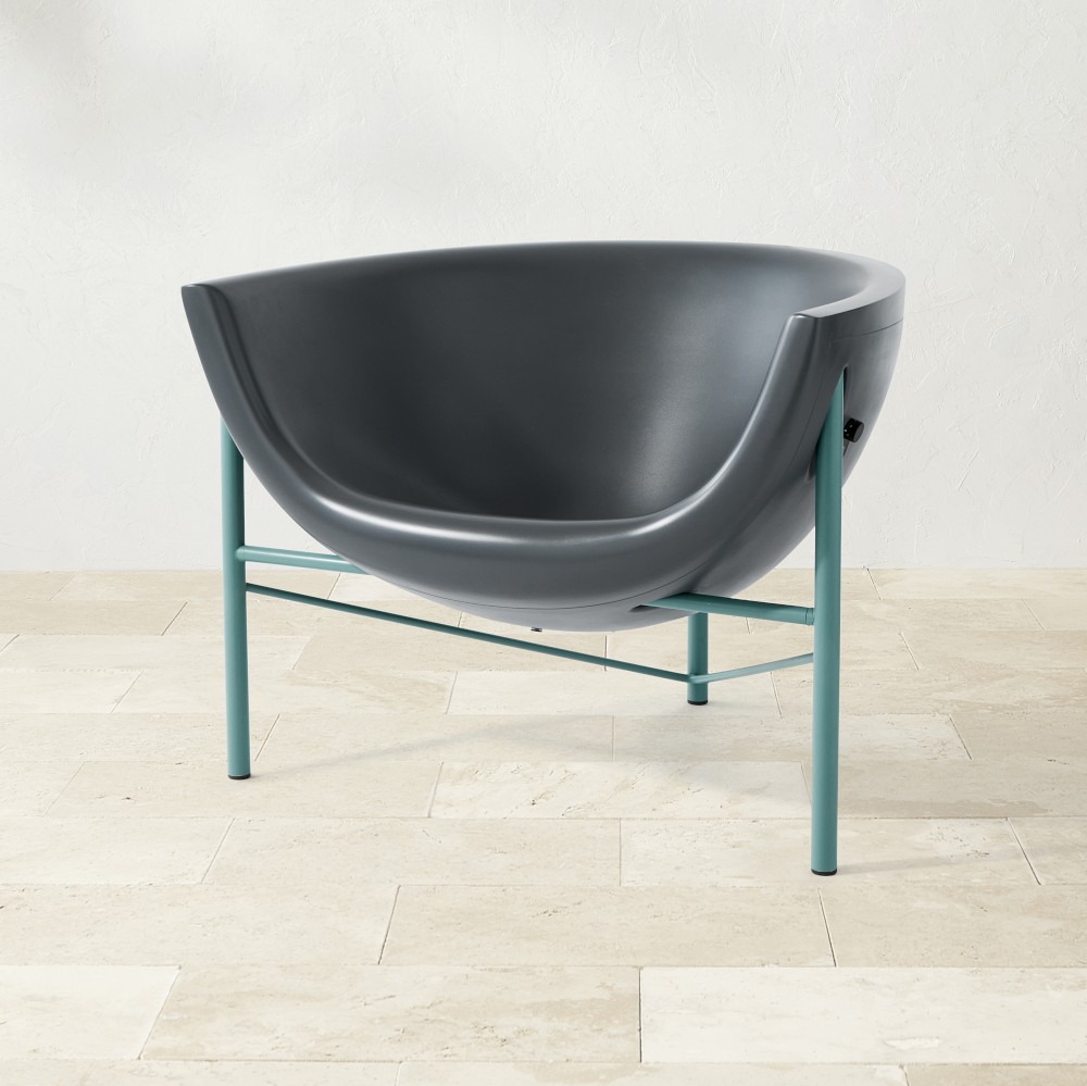 Kosmos chair with curved seat and teal legs from a rear angle