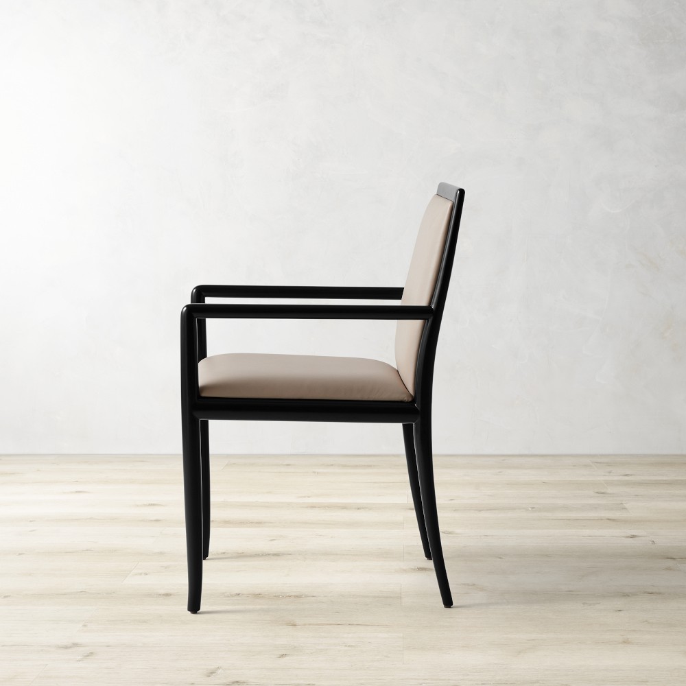 Side view of Roulan dining armchair