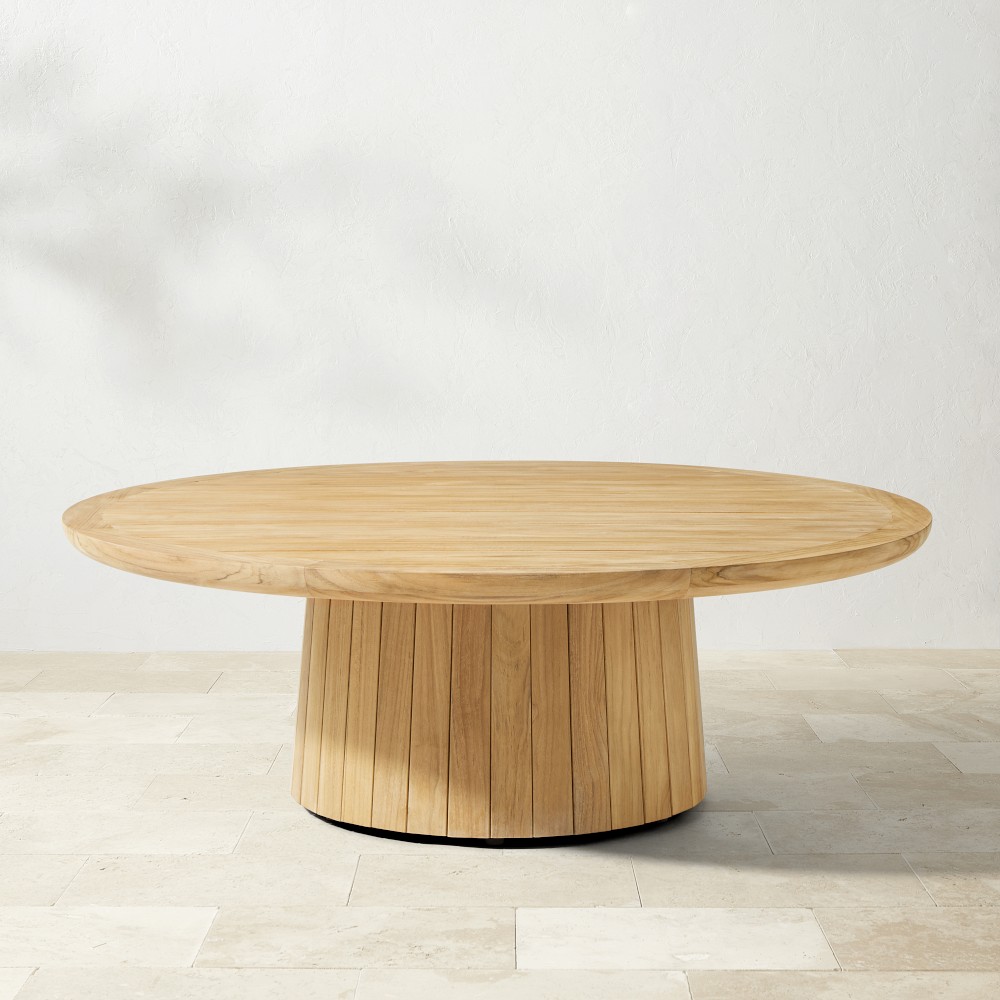 Single round nesting coffee table shown alone