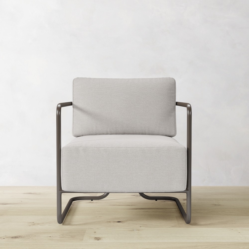 Cream single-seat chair with metal frame