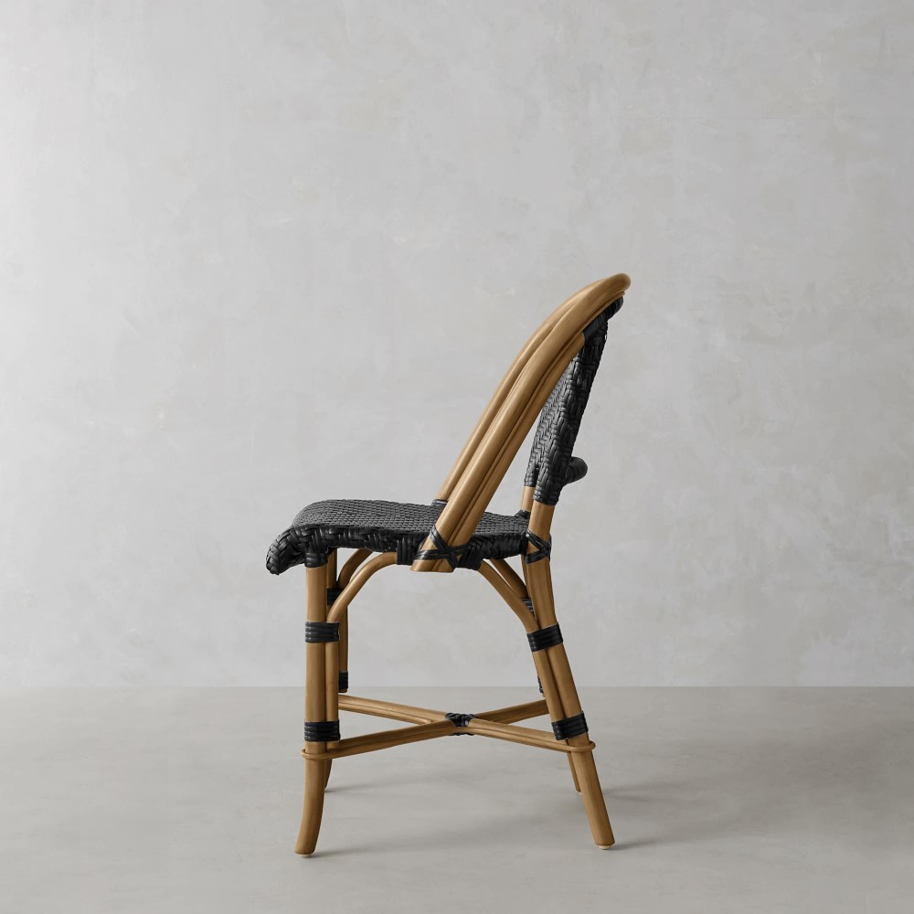 Parisian Bistro woven dining side chair viewed from the side.