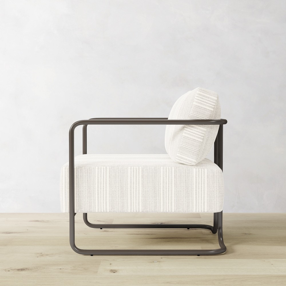Profile view of chair with cantilever base and cushion