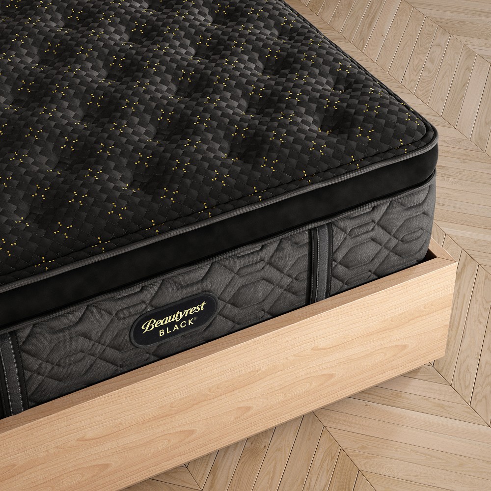 Close-up of Beautyrest Black quilted pattern and logo on side