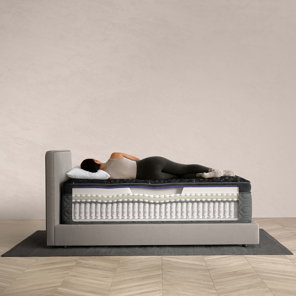Person lying on Beautyrest Black Series Hybrid mattress