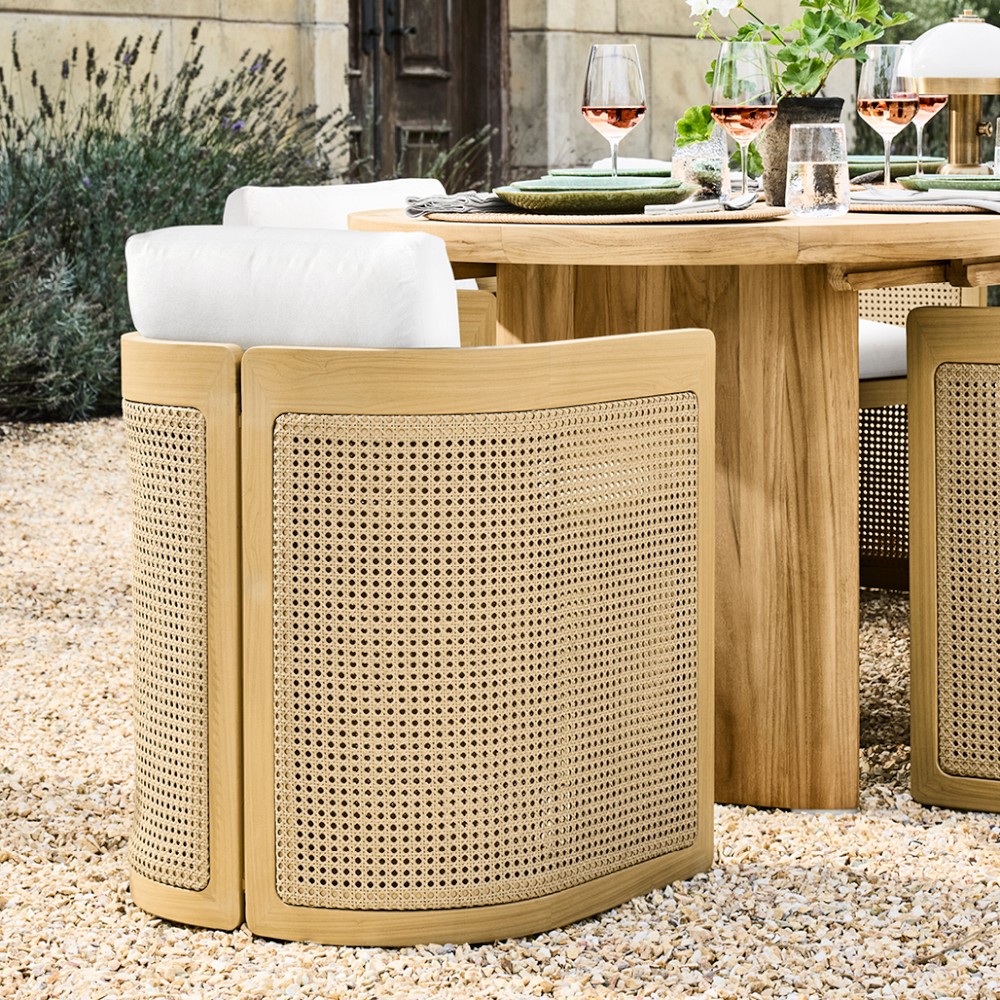 Close-up of the armchair back showing woven rattan panel