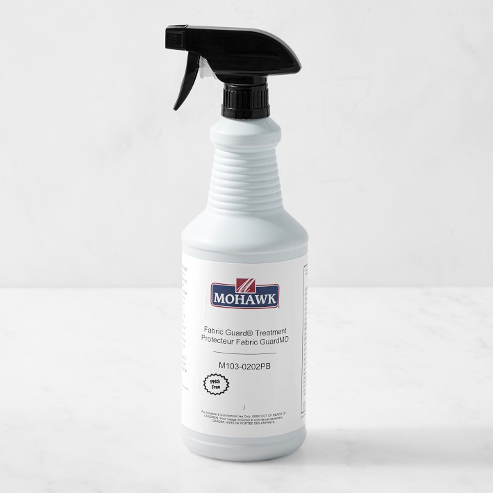 stain guard spray application on upholstered dining chair fabric